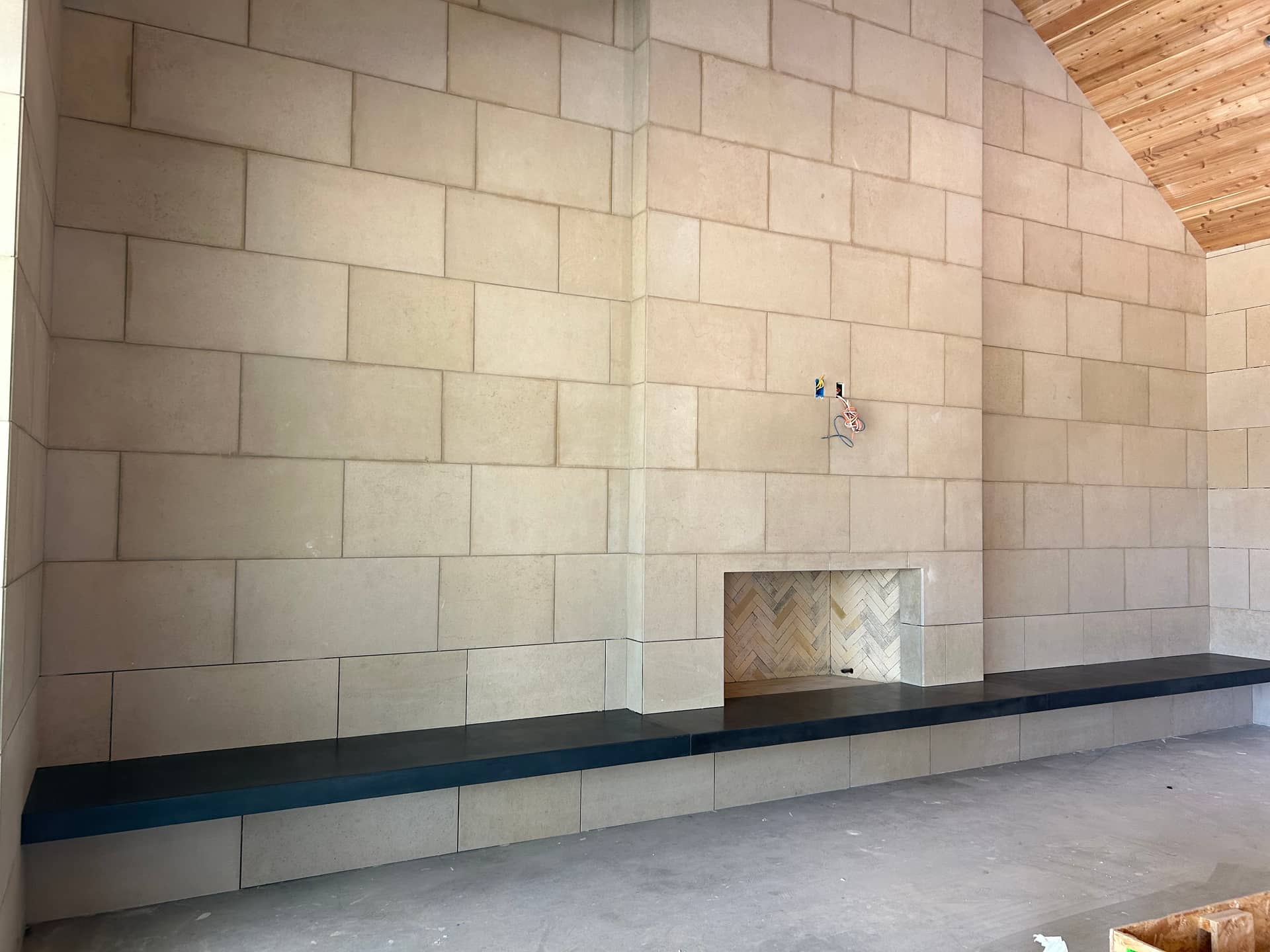Modern precast concrete hearth with polished finish for residential fireplace